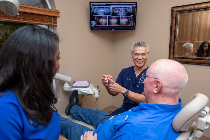 dr keo discussing dental procedure